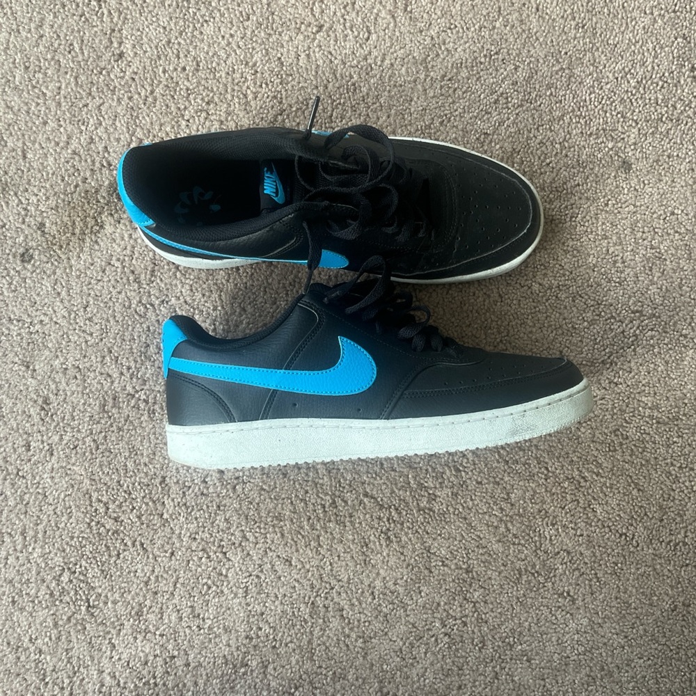 Nike Black Sneakers with Blue Highlights